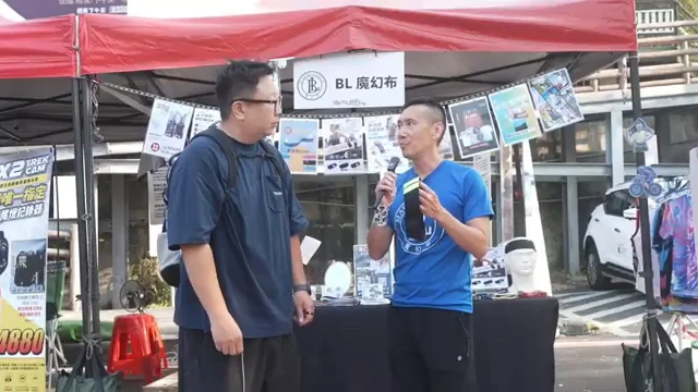 招牌可讀「BL 魔幻布」的現場採訪畫面